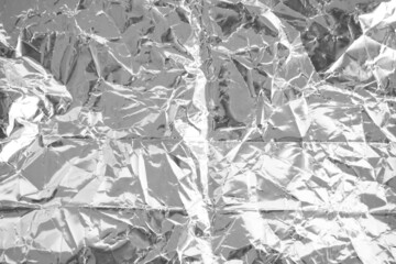 Crumpled metal texture background, aluminum foil
