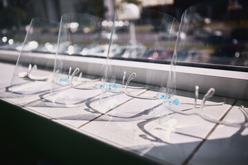 Face Shields are prepared on the white windowsill. It's ready to use.