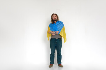 Fototapeta premium Ukrainian man refugee in flag on white background