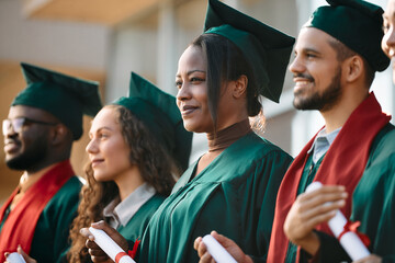 Proud African American student and her classmates during the ceremony at university.