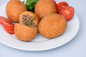 Stuffed meatballs, a traditional Turkish delicacy. Kibbeh is a popular dish in Middle Eastern cuisine (Turkish name; icli kofte)