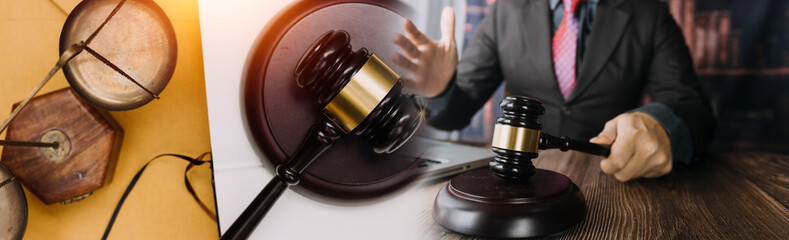 justice and law concept.Male judge in a courtroom on wooden table and Counselor or Male lawyer working in office. Legal law, advice and justice concept.