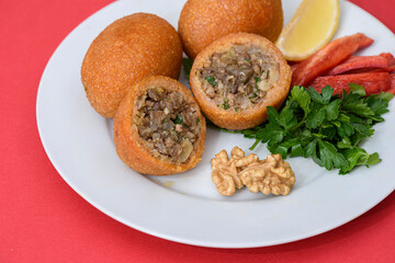 Stuffed meatballs, a traditional Turkish delicacy. Kibbeh is a popular dish in Middle Eastern cuisine (Turkish name; icli kofte)