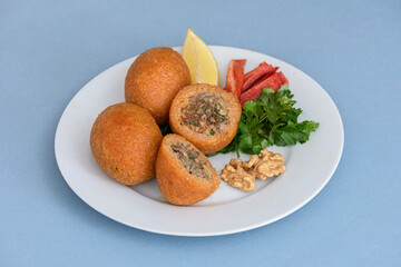 Stuffed meatballs, a traditional Turkish delicacy. Kibbeh is a popular dish in Middle Eastern cuisine (Turkish name; icli kofte)