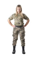 Full length portrait of a female soldier in camouflage uniform with hands on hips isolated on a white