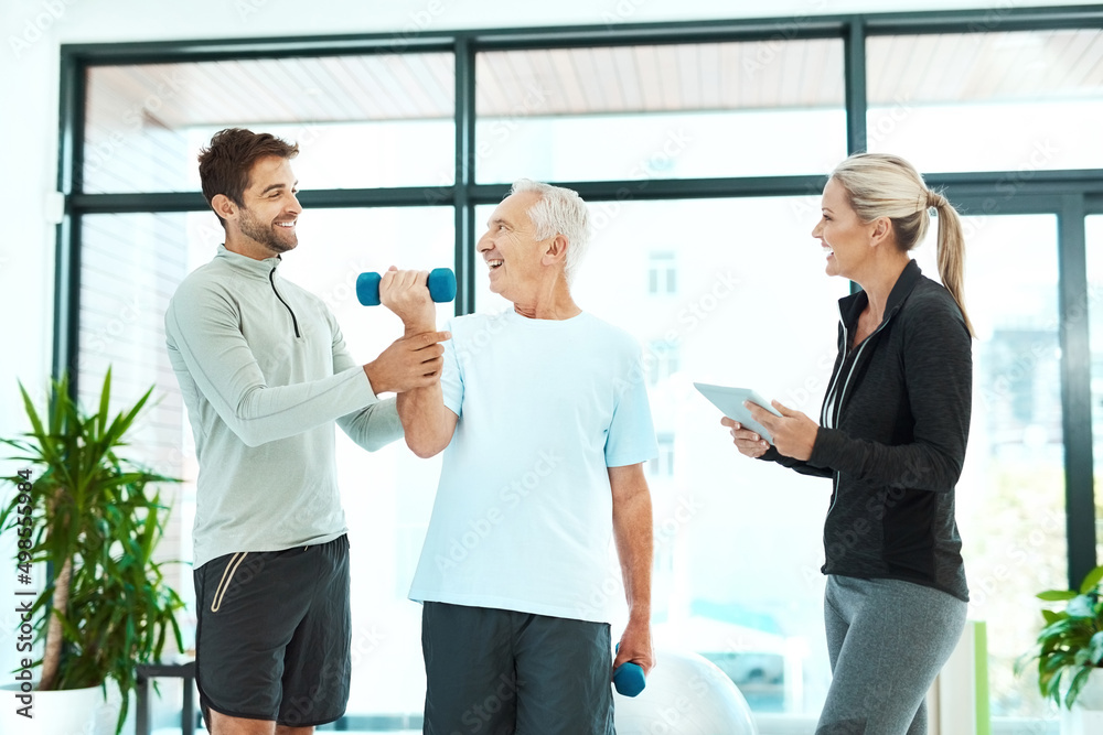 Canvas Prints Lets make sure you stay in control of your body. Shot of physiotherapists working with a senior therapist.