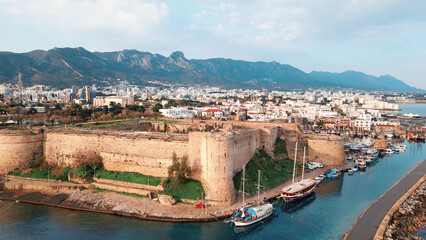 Obraz premium Kyrenia Castle medieval building and historical old harbour in Kyrenia, North Cyprus