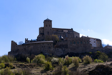 Beautiful medieval catholic church and castle Basilique de Val&egrave;re (Valeria) on a hill at City of Sion on a sunny spring day. Photo taken April 4th, 2022, Sion, Switzerland.