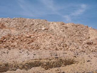 Sunny landscape in a hot rocky desertof northern Africa.