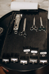 a set of professional barber's tools and scissors