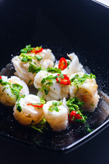 marinated sepia with parsley and chilli pepper filled with rice