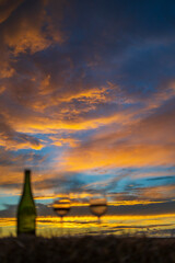 Fototapeta premium glass of wine with sunset in late summer