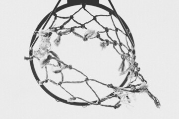 Grayscale low angle shot of a basketball hoop © Wirestock Creators