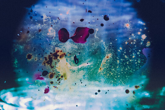 Abstract blue background black pink splash