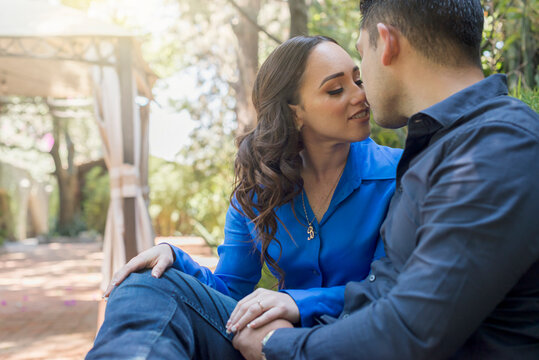 Romantic latin couple enjoying their love and ready to kiss each other