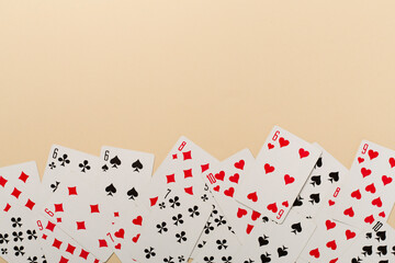 Playing cards on color background. Gambling concept. Top view