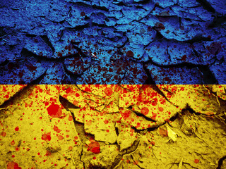 Flag of Ukraine with blood splatter on the cracked dry ground, military conflict in Ukraine concept