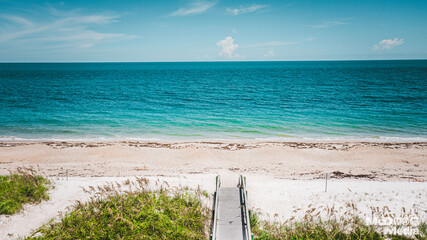 View of the sunny, sandy and tropical Vero beach and the ocean in Florida, United States