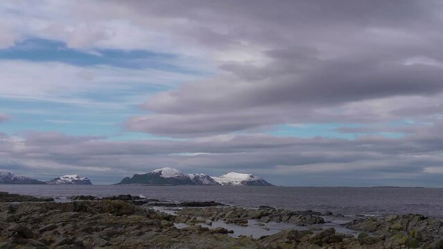 the Norwegian coast at Ulsteinvik- Time lapse clouds over Runde