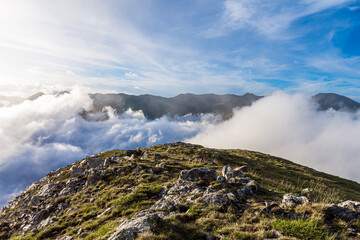 Clouds over the mountains (sunset fromt the top of the Peak of Balandrau, Pyrenees Mountains)