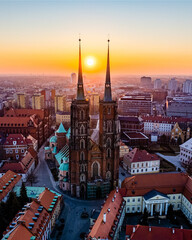 Aerial shot of cathedral towers and  old european buildings in Wroclaw, Poland