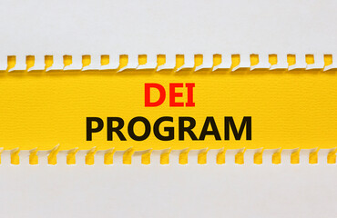 DEI diversity equity inclusion program symbol. Yellow paper with words DEI program on beautiful...