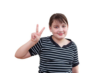 Studio shot of  young 12 year old girl showing victory sign
