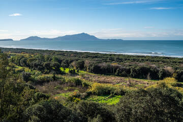 Scenic coastal landscape with Ischia island viewed from Cumae ar