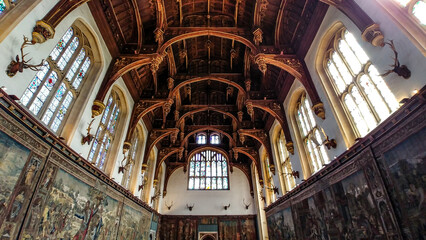 Magnificent Hampton Court hall impresses with its size, beauty of the ceiling, stained glass windows