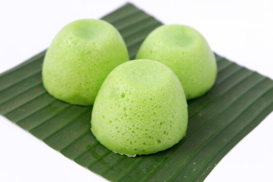 Photo of Apam Kampung Perisa Pandan, a Malaysian dessert, isolated on a white background