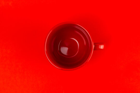 Top View Red Mug On A Red Background