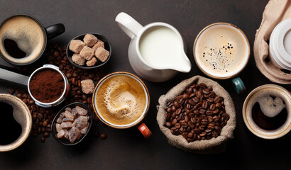 Fresh cappuccino and espresso coffee, roasted coffee beans, sugar and milk