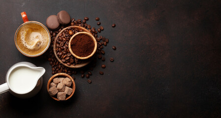 Fresh espresso coffee, roasted coffee beans and macaroons