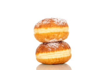 Two sweet donuts stuffed with jam, macro, isolated on a white background.