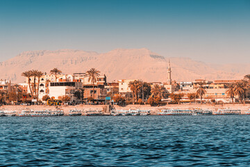 The famous city of Luxor on the coast of the Great River Nile in Egypt. Tourist attractions and wonders of the world