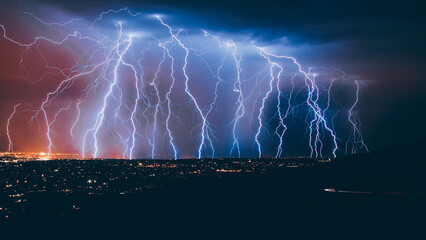 Fascinating shot of heavy lightnings in the night sky