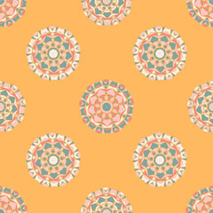 Boho style. Seamless vector pattern of geometric round ethnic decorative elements in the form of a mosaic in muted colors. Vector mandala background with oriental, floral motifs.