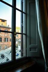 The Spanish Steps in Rome from a window in a dark room