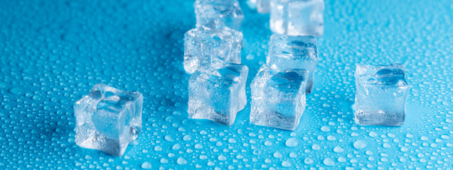 Ice cubes on a blue background