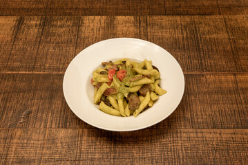 Pork penis with zucchini! In addition to the zucchini, this pork penne recipe has a great blend of herbs and spices.