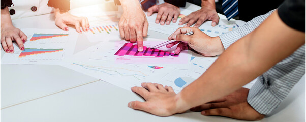 group of people making plan with the help of chart for their business