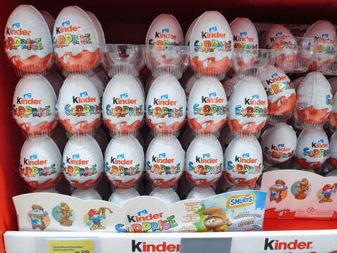 Tallinn, Estonia - 04.12.2022: Kinder Surprise chocolate eggs and other Kinder Easter products on display in supermarket. Kinder chocolate by Ferrero company.