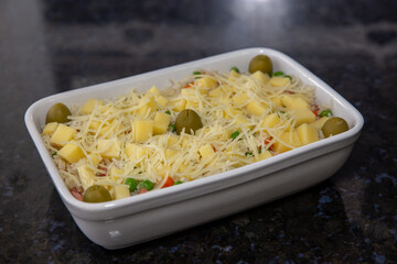 Raw rice with cheese and fresh herbs typical Brazilian. 