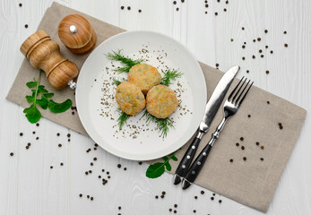 Steamed chicken cutlets with vegetables.