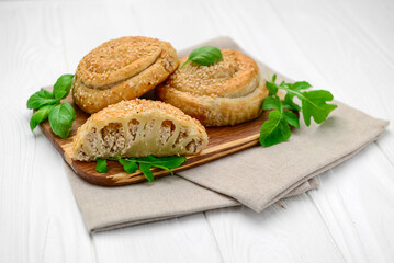 Twist Pie. Greek twist meat pie on white background