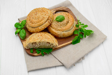 Twist Pie. Greek twist meat pie on white background