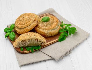 Twist Pie. Greek twist meat pie on white background