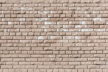 Colorful brick wall background outside of the building.