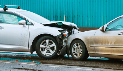 car collision accident on street. Two cars crashed in front - 498632176