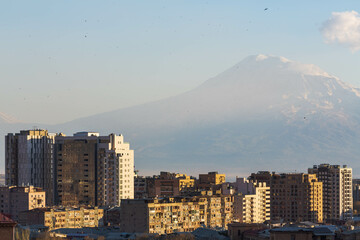 Obraz premium Mount Ararat and Yerevan viewed from Cascade at sunset, Yerevan, Armenia, Middle East, Asia